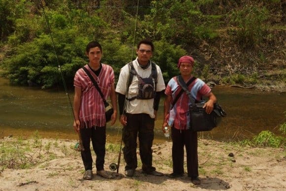 Karen assistants with fishing guide Bobby Kaotakol